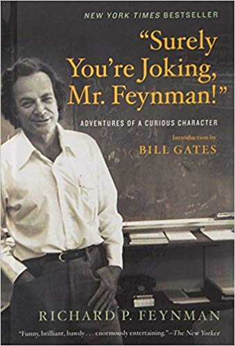 book cover showing a middle-aged Richard Feynman sitting on a desk by a huge chalkboard