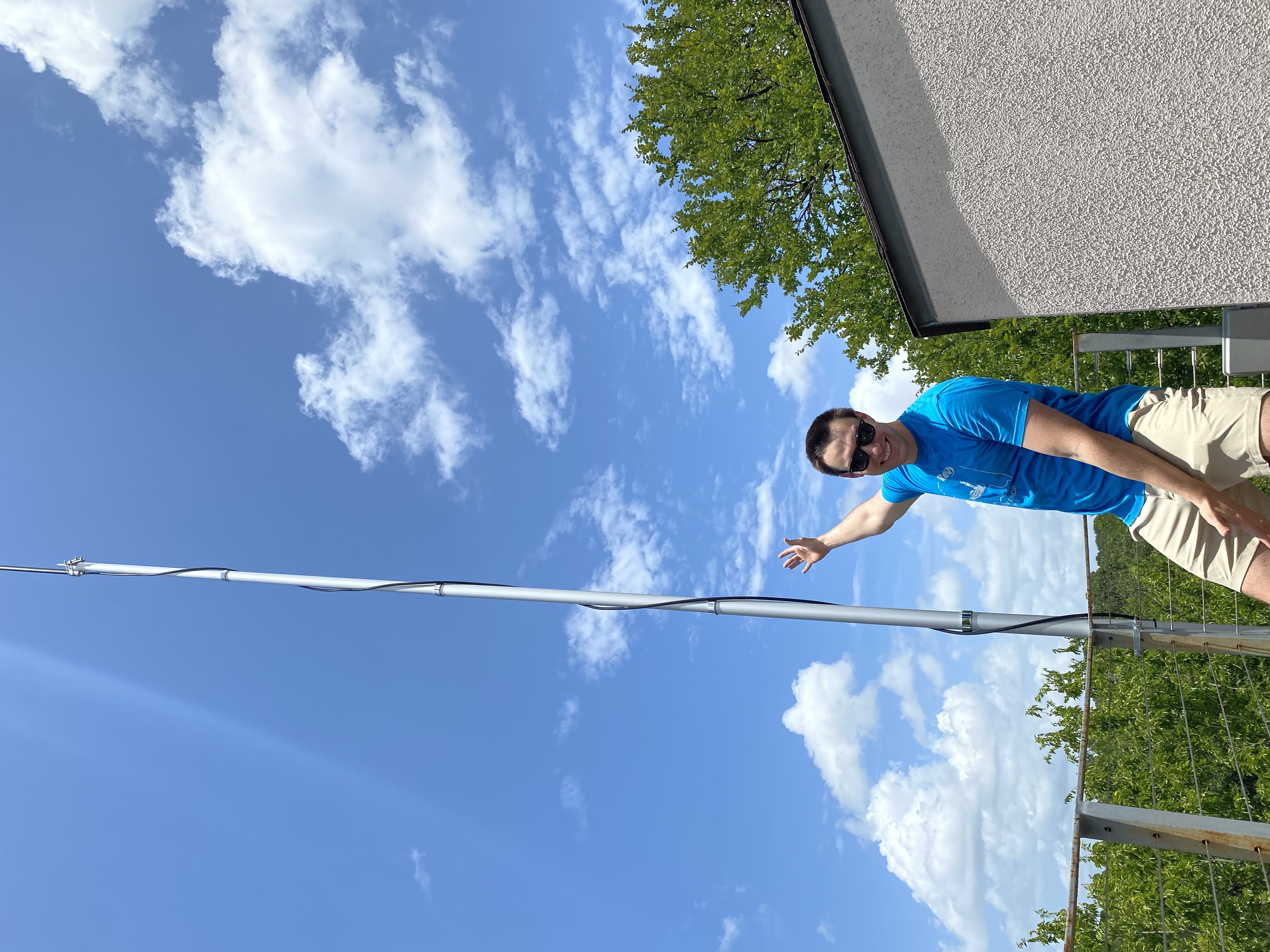 Me, standing next to a tall antenna